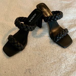 Strappy braided black sandals with nice heel. Worn twice; like new.